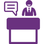 A purple icon depicting a person in a suit standing behind an exhibition stand with a speech bubble.